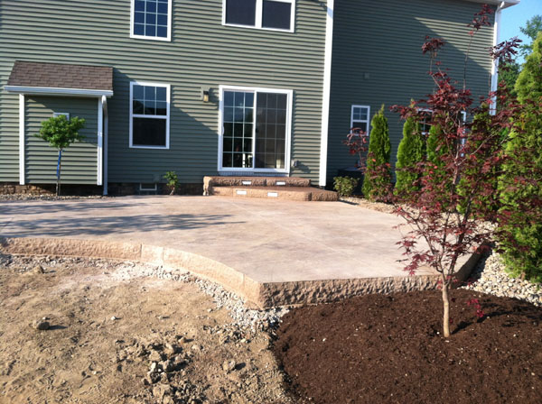 Rock Face Elevated Concrete Patio